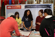 Photo of Students in front of display